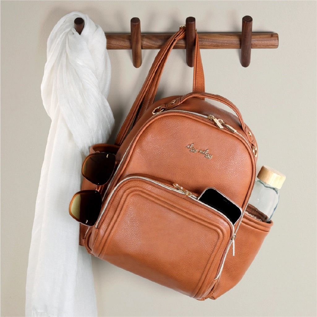 Cognac Itzy Mini Plus™ Diaper Bag Backpack