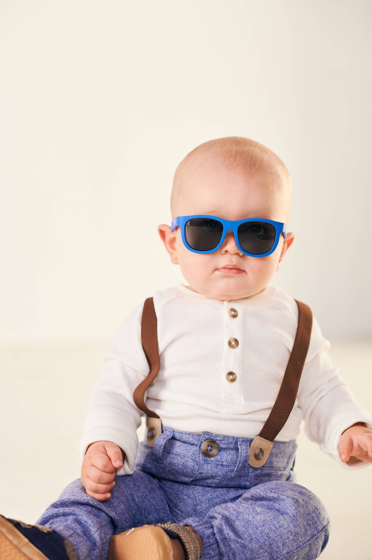 Baby wearing Blue Sunglasses