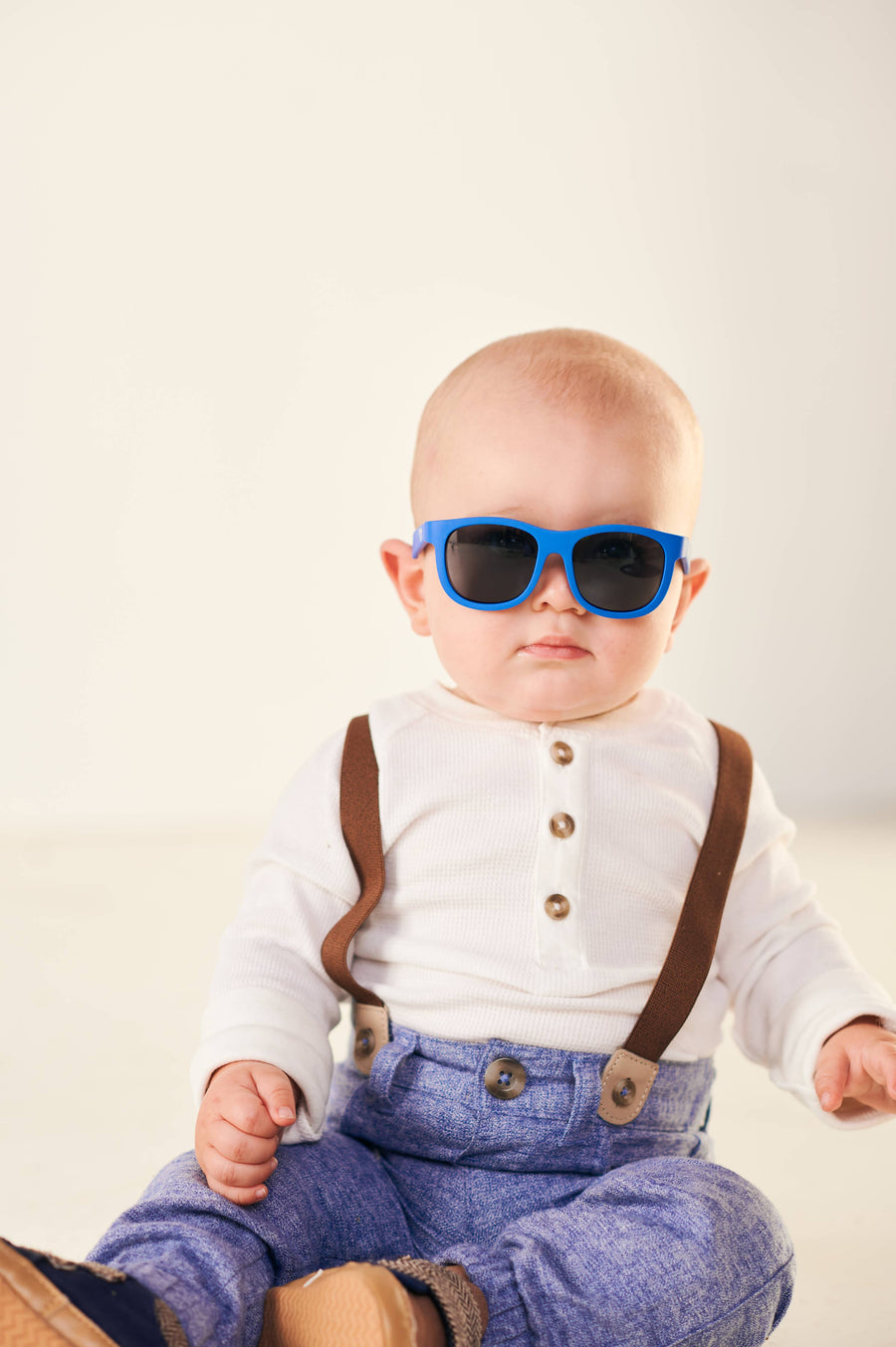 Baby wearing Blue Sunglasses
