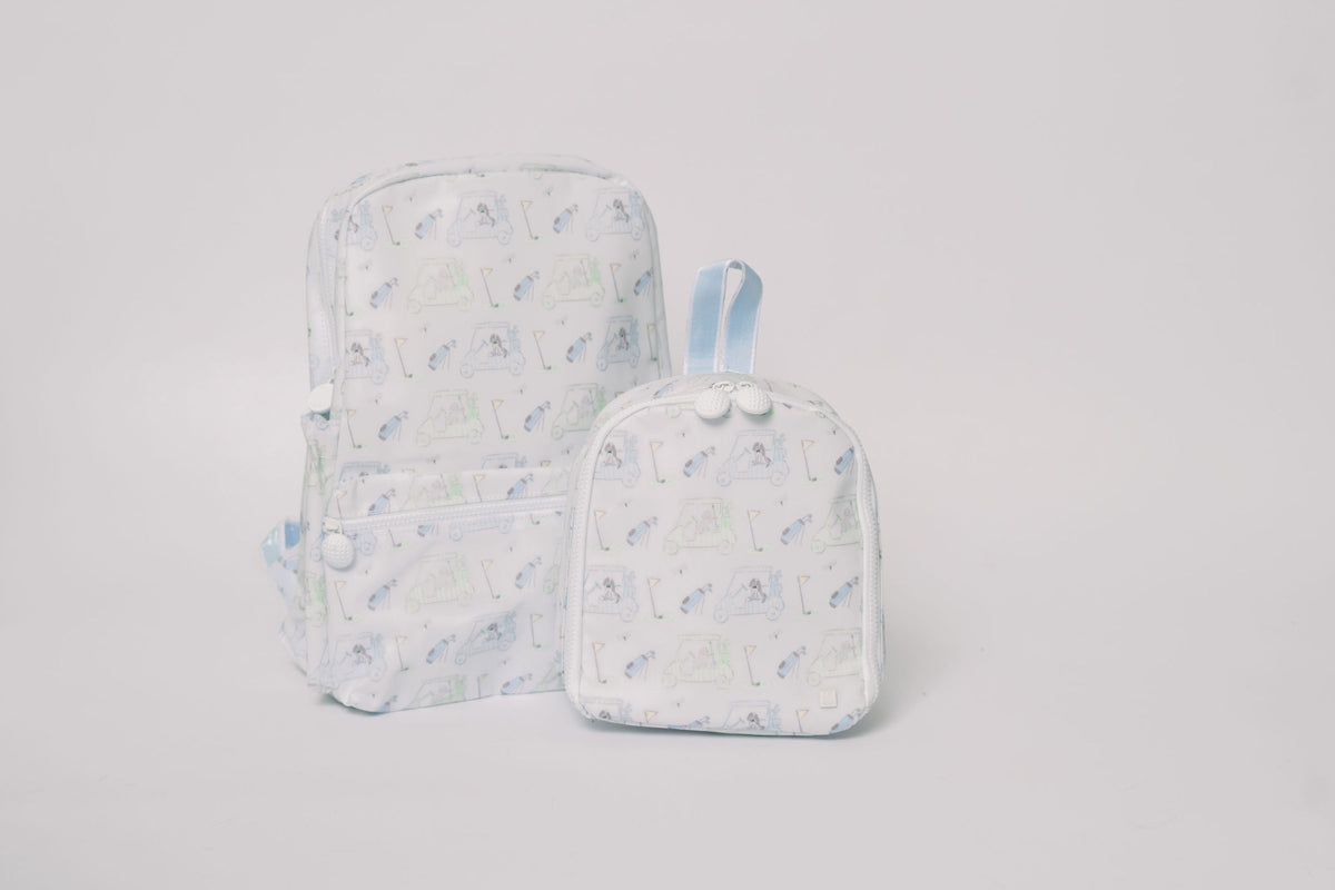 Dapper Babies Bak to School bundle which includes the TRVL Backpacker, TRVL Insulated Bring It Lunch Bag in the Pimlico Putt Putt Print.