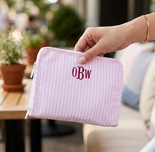 Hand holding organiser